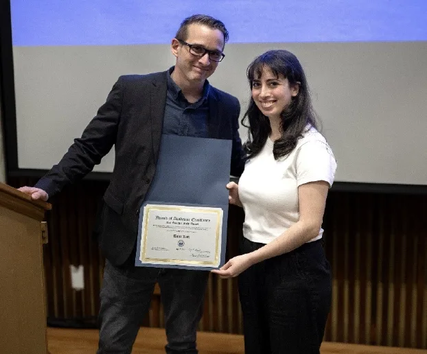 Professor Ware presenting Talia Katz with an award.