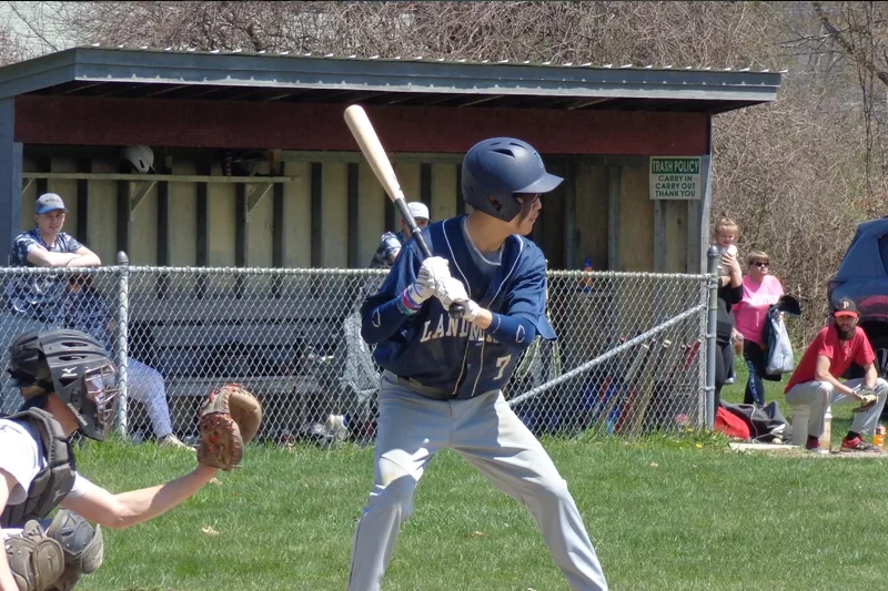 A LC baseball player going up for bat