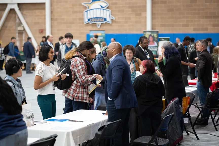 A large group of students and business professionals at the fall 2025 Career fair.