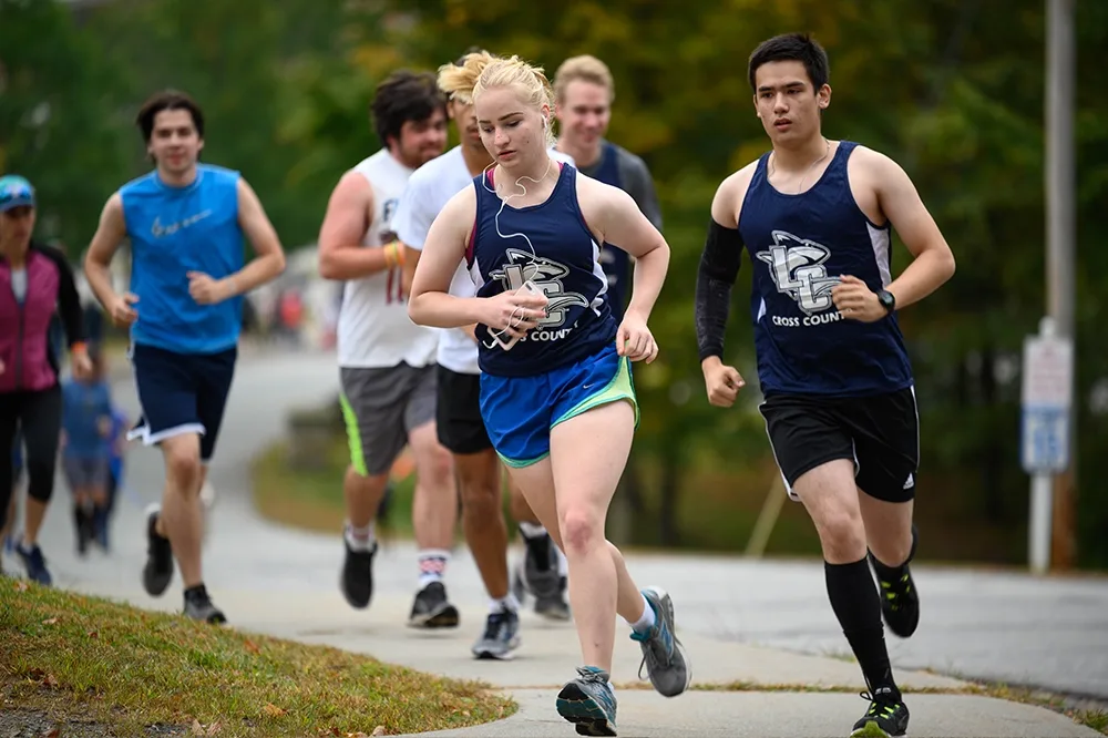 LC Athletes running on campus