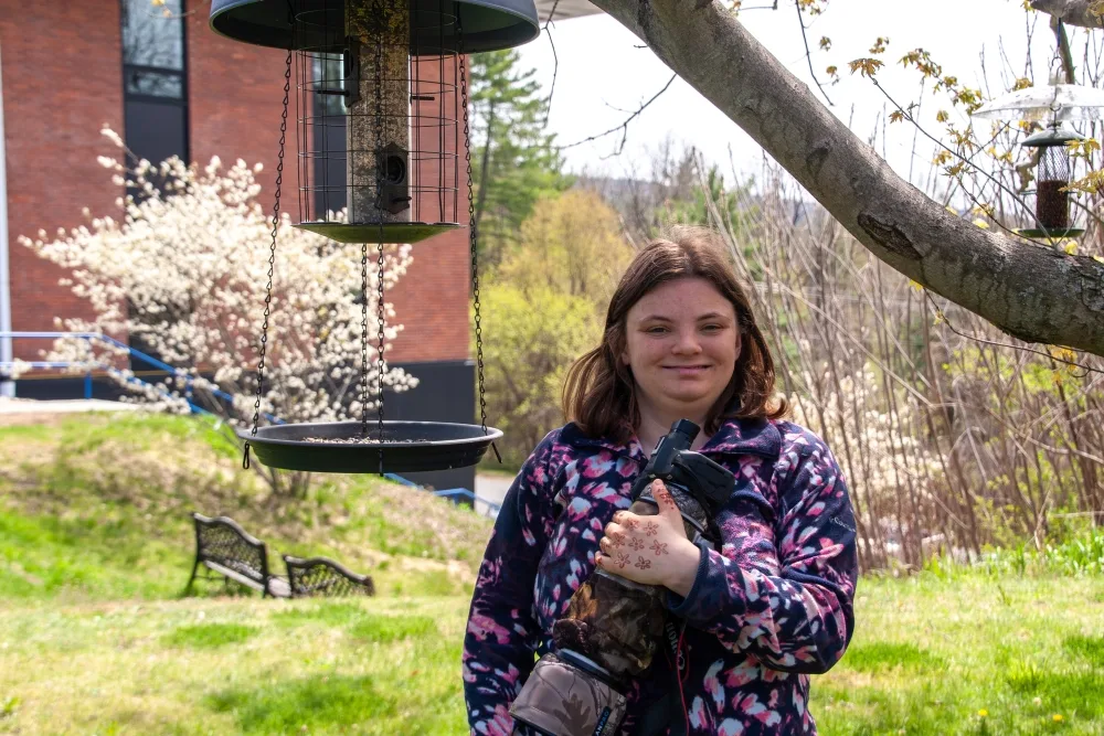 Molly-with-birdfeeder-1000px.webp