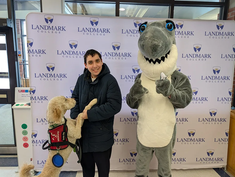Zack Carr and his service dog pictured with Finn.