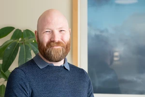 Headshot of Cole Denisen.