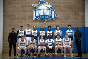 Members of the 2024-25 Landmark College Men's Basketball team in Click Family Sports Center.