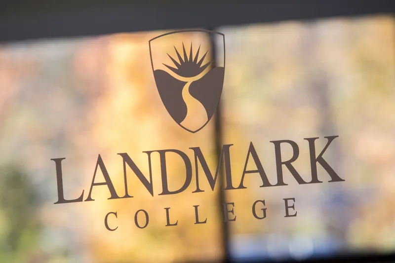Landmark College logo on a glass door.