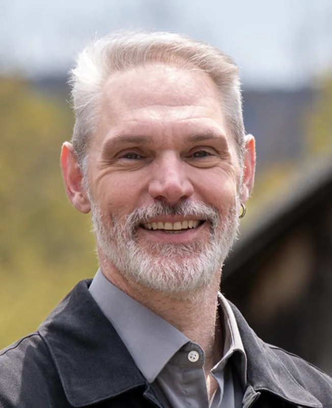Headshot of Chris Lenois.