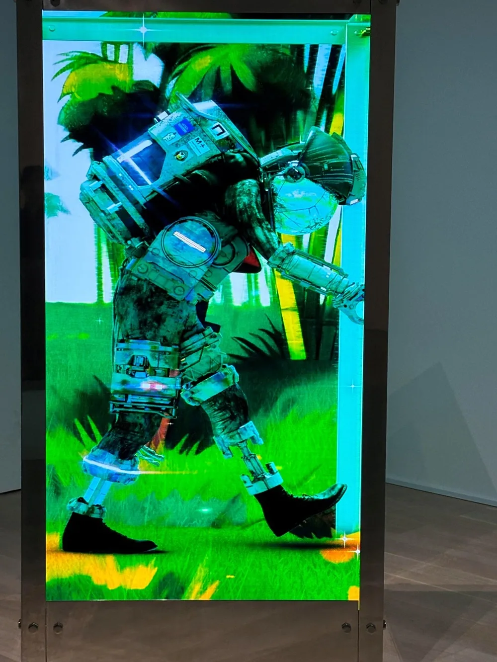 A man in a seal environment suit walking through a digital landscape, all within a box