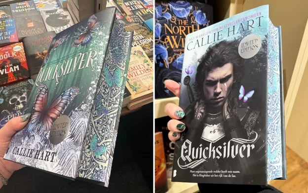 Two Dutch versions of fantasy book Quicksilver held to display ornate art on the page edges