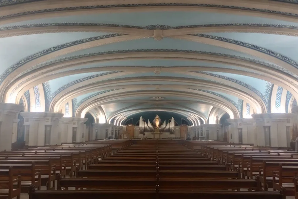A view of a chapel interior with blue walls