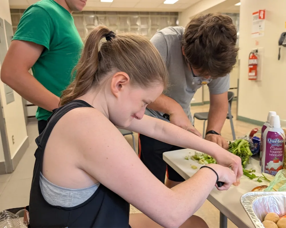 Students chopping vegetables