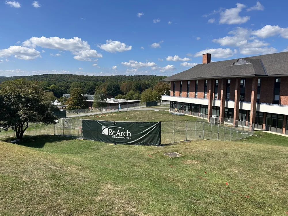 construction fencing on green space