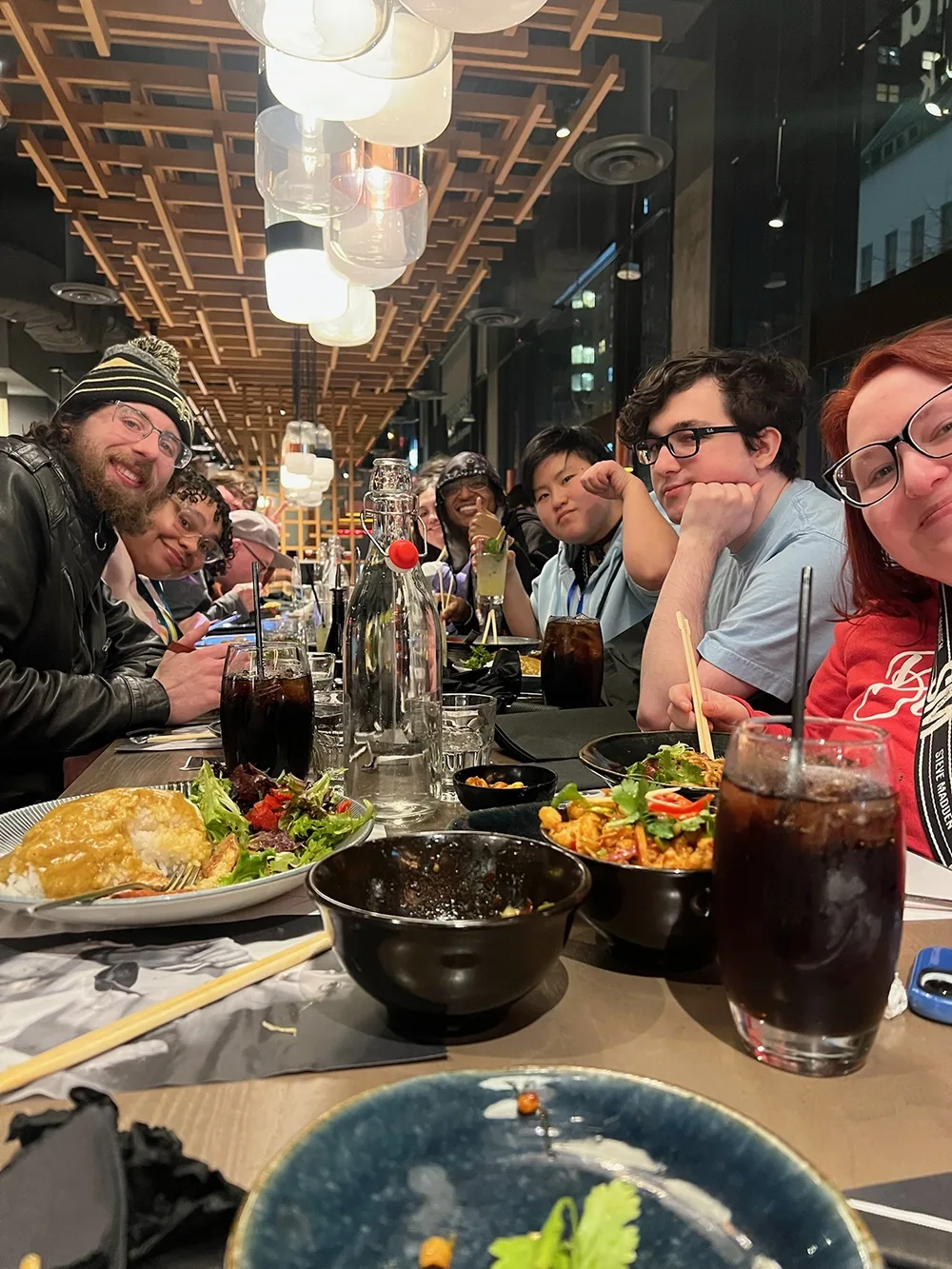 A group of students around a restaurant table