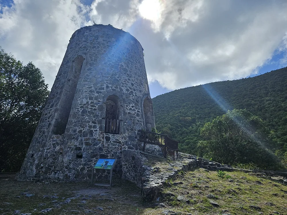 stone towerlike structure on a craggy hillside