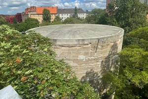 Looking at the large cylindrical structure from above.