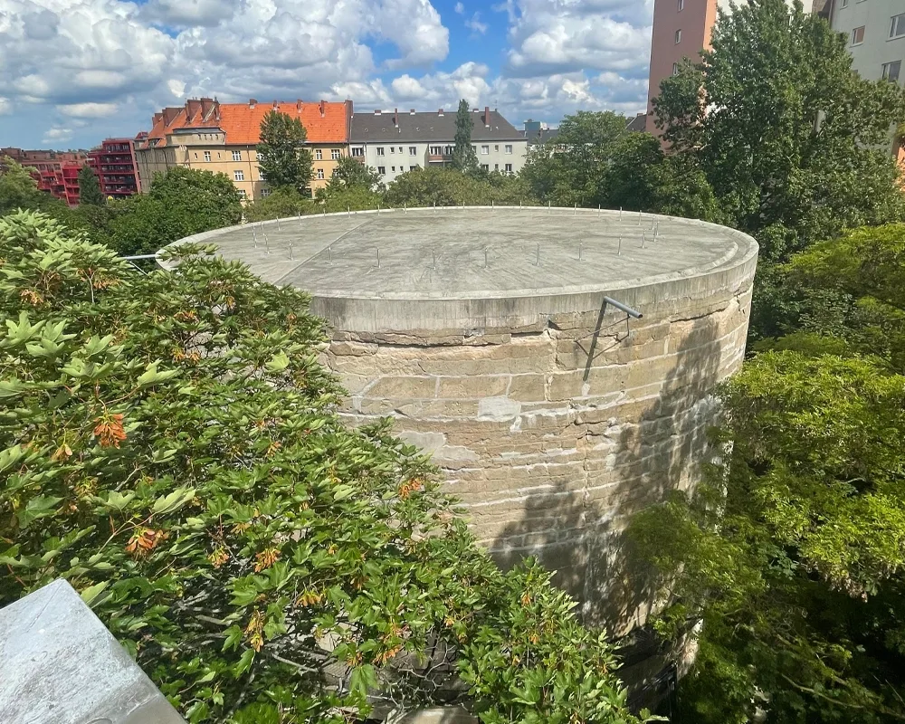Looking at the large cylindrical structure from above.