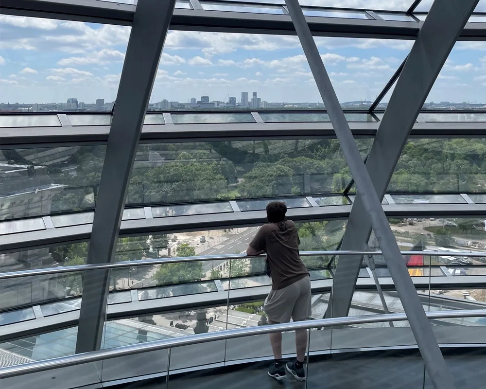 one person looking out at a view of Berlin.