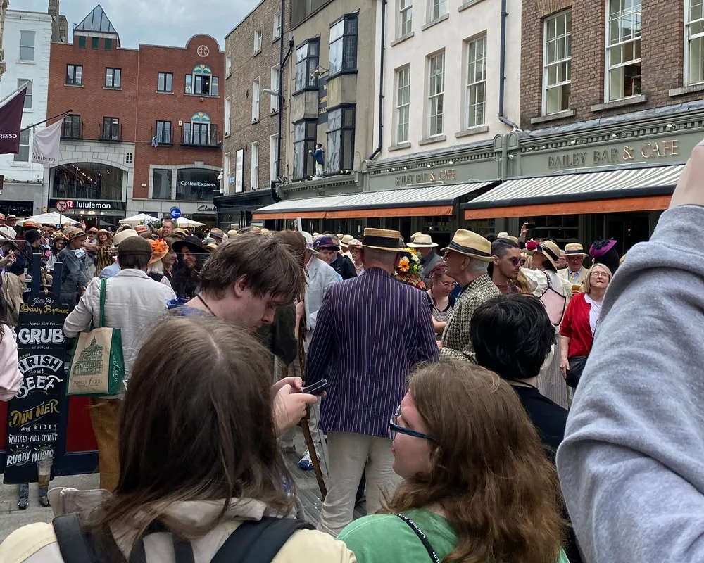 Landmark Students on Duke Street on Bloomsday in front of Davy Bryne's