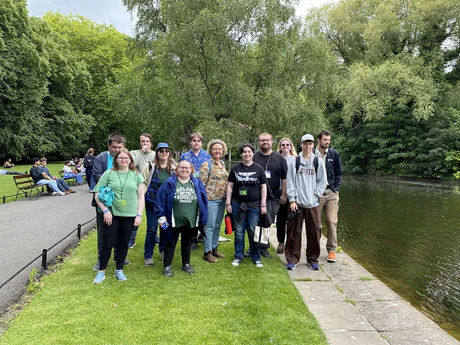 Ireland Program students standing on the lawn next to the water in St. Stephen's Green.