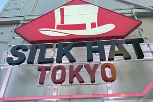 A large sign reading SILK HAT TOKYO.