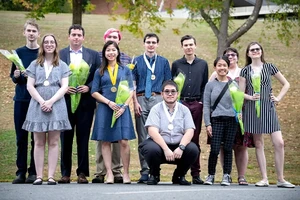 Honor society students pose for a photo.
