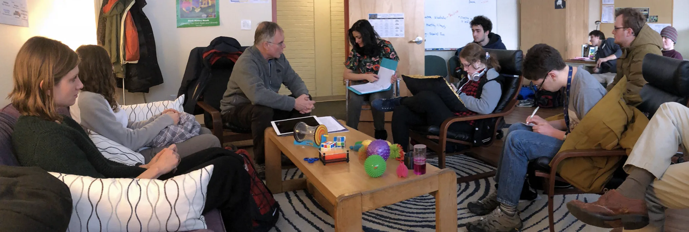 A group of students hanging out in a chill room.