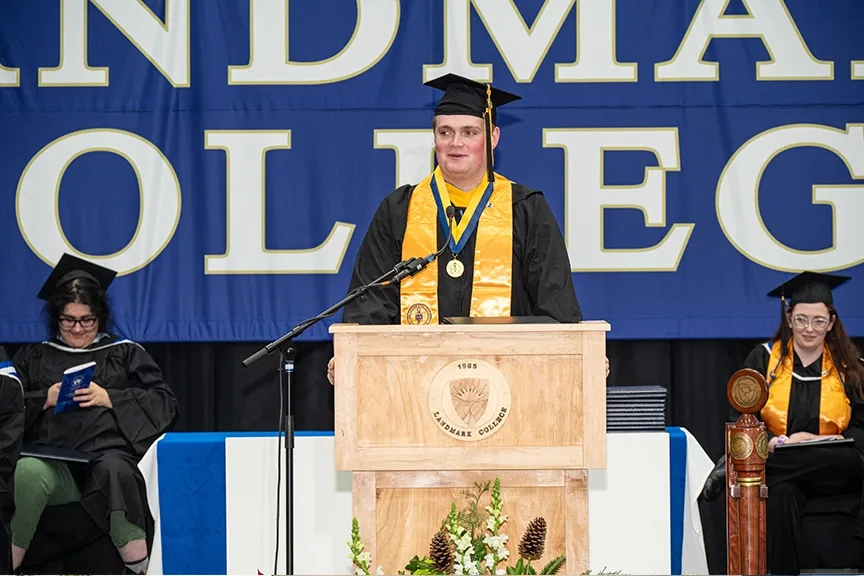 Kenneth Schlegel standing at the podium and giving a speech