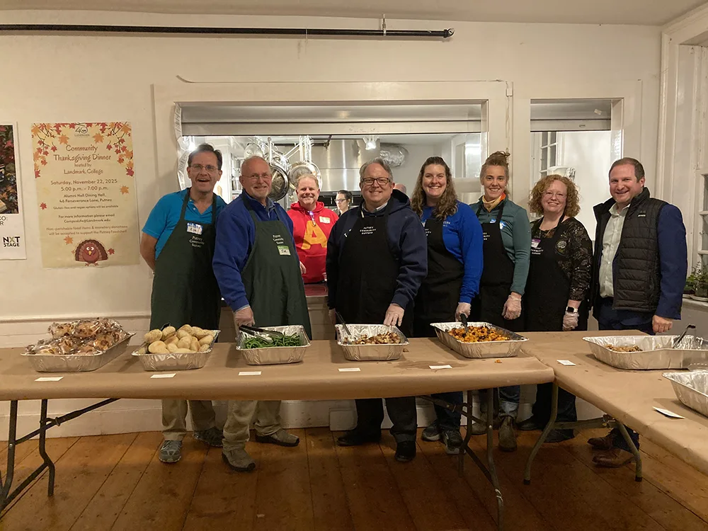 Members of the Landmark College leadership team pose for a picture while handing out food at the Putney Community Supper on Friday, November 14.
