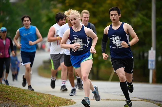 Members of the Landmark College running team, mid-competition.