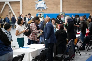 Students and employers networking at the 2025 career fair at Landmark College Click Center.