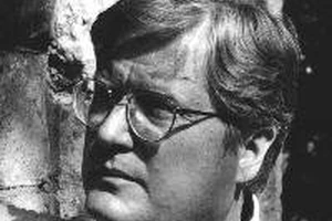 Headshot of Thomas West.