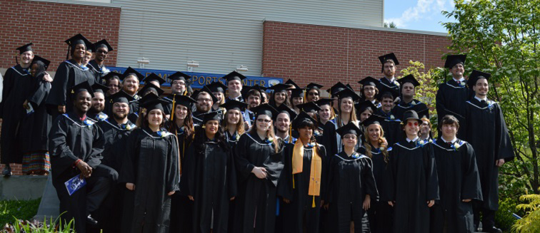 Graduates outside the Click Center.