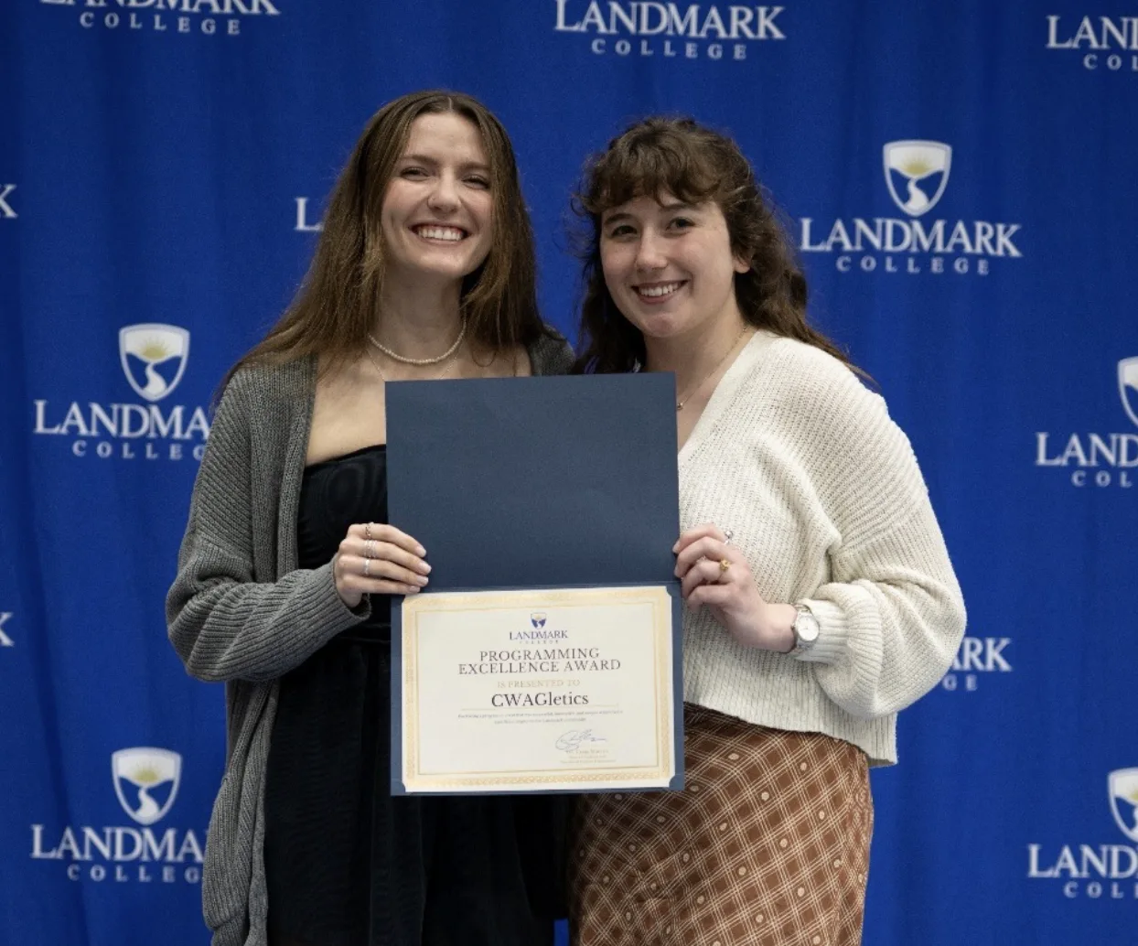 Representatives, Claudia Sherman and Brigid Hamwey hold the award for CWAGletics.