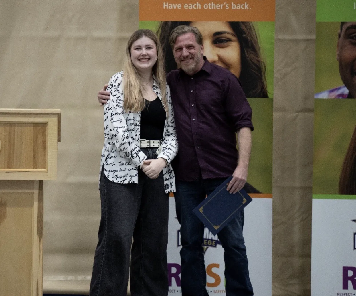 Grace Nelson with presenter Jamie Harvey to the right.