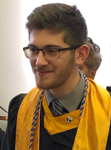 Mark Broomer in cap and gown.