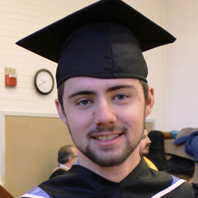 Robert Lutz in cap and gown.