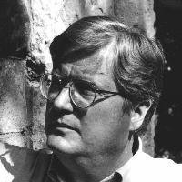 Headshot of Thomas West.