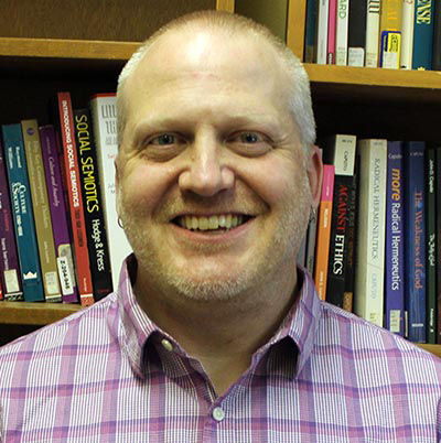 Headshot of Daniel Miller.