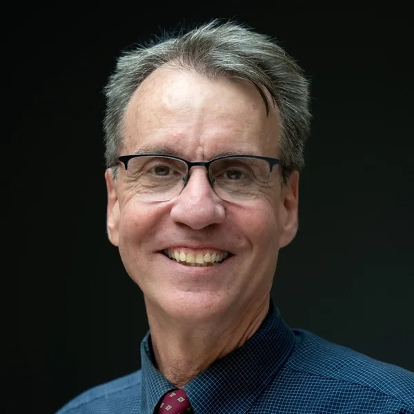 Headshot of Eric Rhomberg.