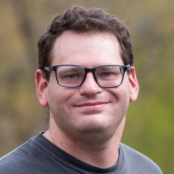 Headshot of Gus Zarefsky.
