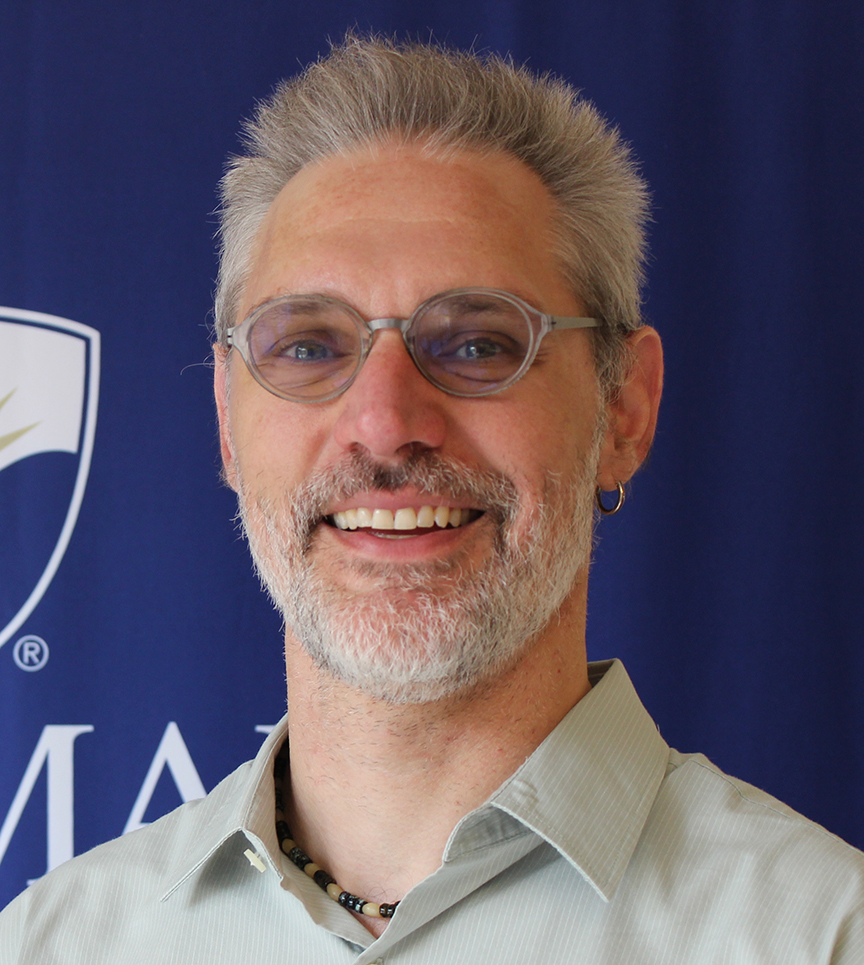Headshot of Chris Lenois.