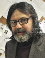 Headshot of John Rose.