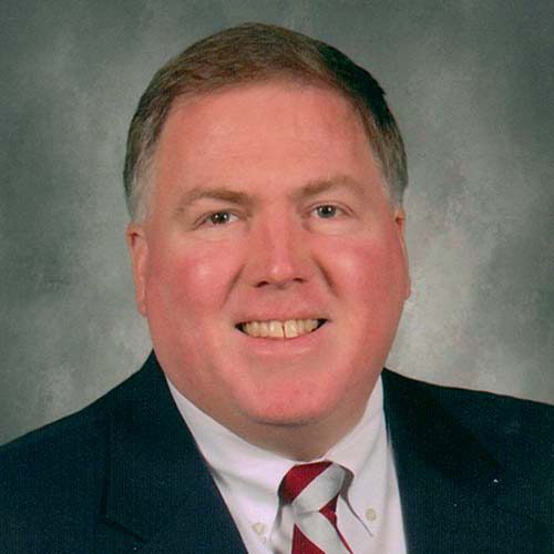 Headshot of Tom Oxholm.