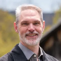 Headshot of Christopher Lenois. 