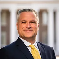 Headshot of Dan Buryj. 