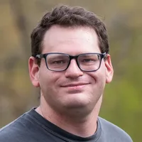 Headshot of Gus Zarefsky. 